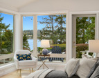 Large windows showcase the territorial and water views.