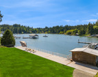 The expansive lawn and shoreside Ipe deck. 