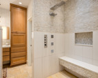 The tiled, walk-in shower. The suite offers an enormous walk-in closet with built-ins, a purse closet and shoe closet, all with cedar lining accents. 