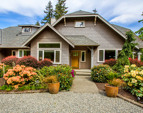 Professionally landscaped with color throughout every season, the entry way draws you in with rich vibrant plantings.