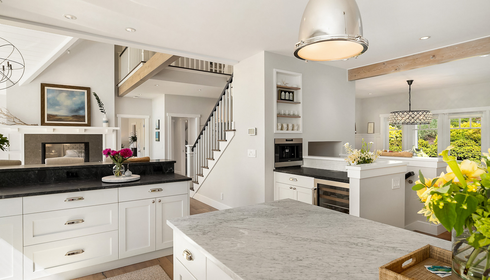 9' Carrara marble island is the centerpiece of the kitchen.