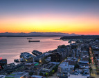 The penthouse offers sweeping unobstructed views of Puget Sound and the Olympic Mountains.