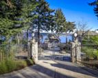 End of the road privacy and peace and quiet on legendary Watauga Beach Drive...gated and fully fenced entry.