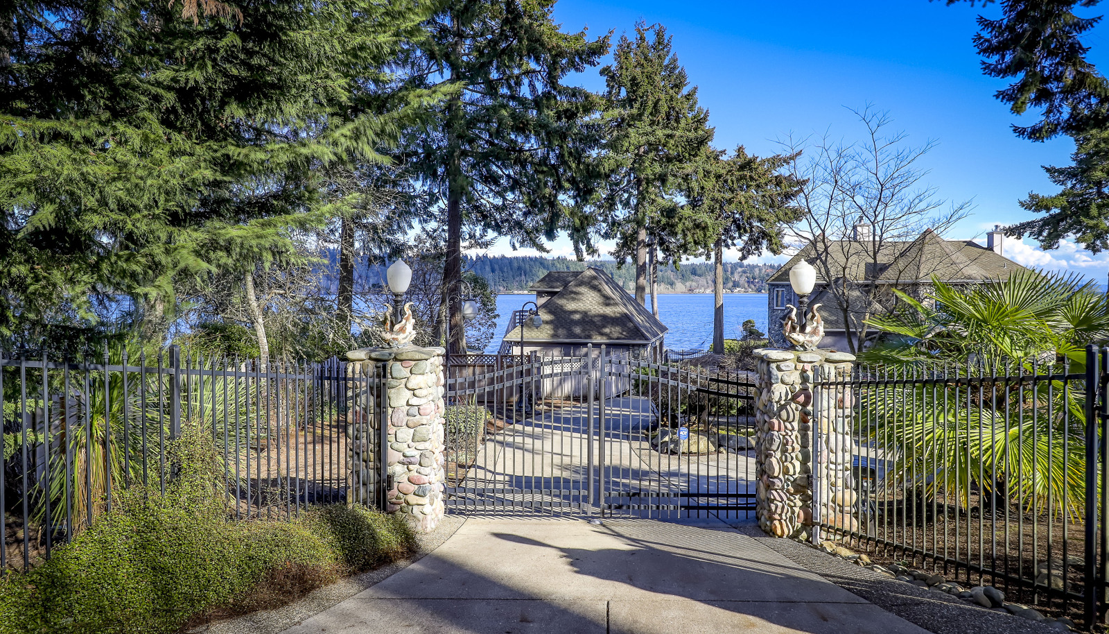 End of the road privacy and peace and quiet on legendary Watauga Beach Drive...gated and fully fenced entry.