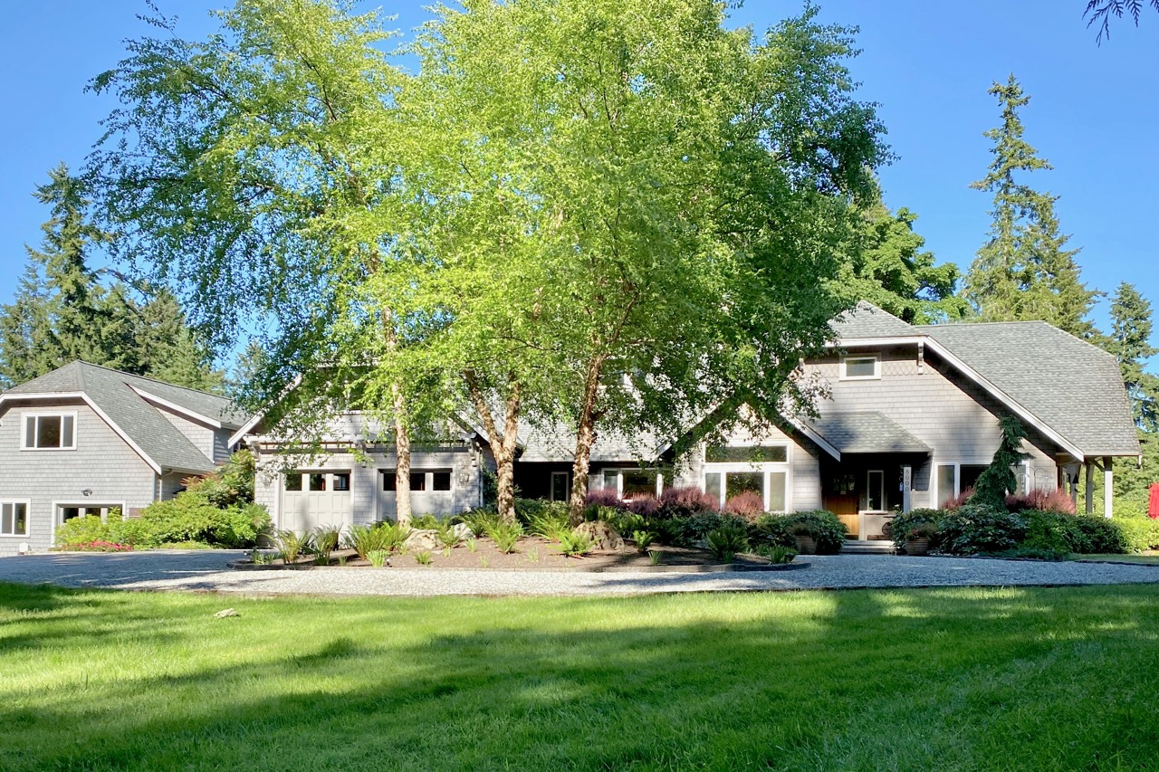 1.2+ acres: Manicured lawns, colorful gardens