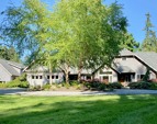 1.2+ acres: Manicured lawns, colorful gardens