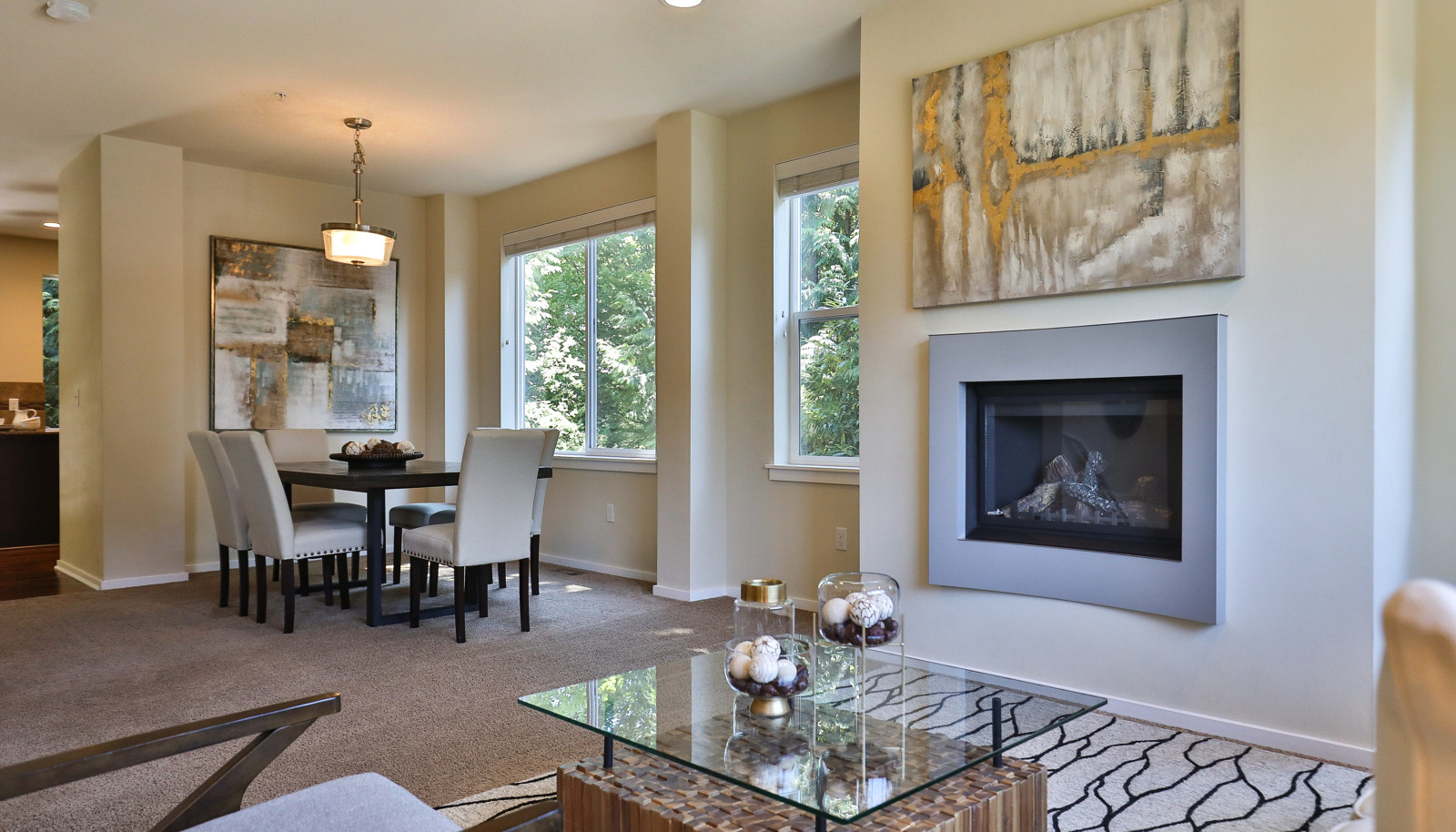 Modern gas fireplace gives living room a sophisticated ambiance.