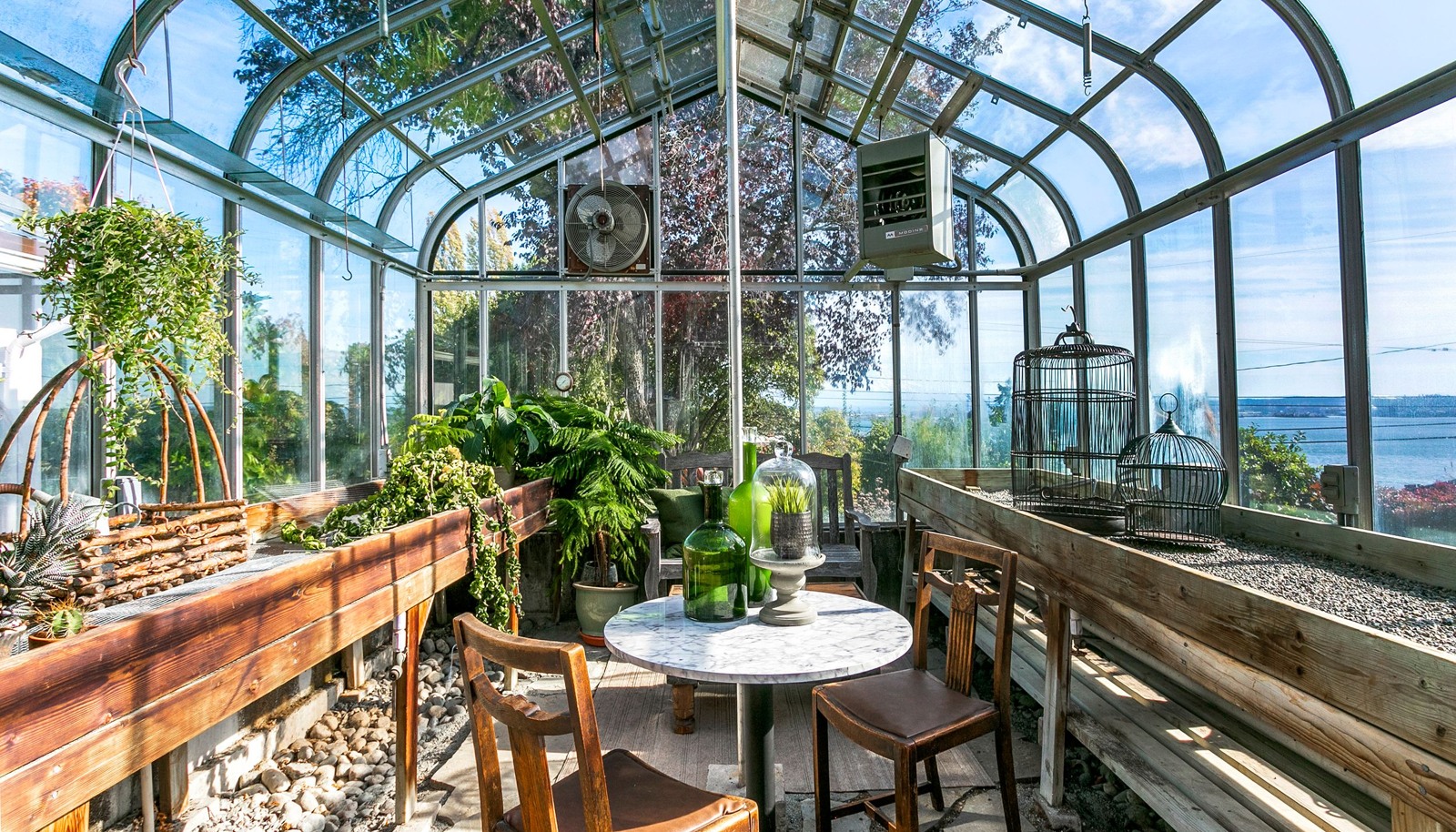 Enormous greenhouse for your gardening pleasure or unique venue for hosting dinner parties.