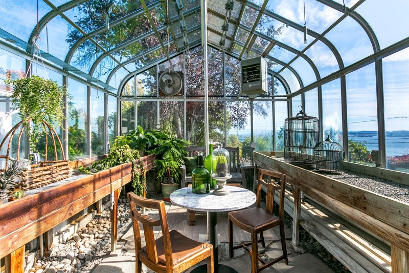 Enormous greenhouse for your gardening pleasure or unique venue for hosting dinner parties.