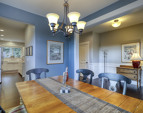 Formal dining room with easy access to the Chef's gourmet updated kitchen!