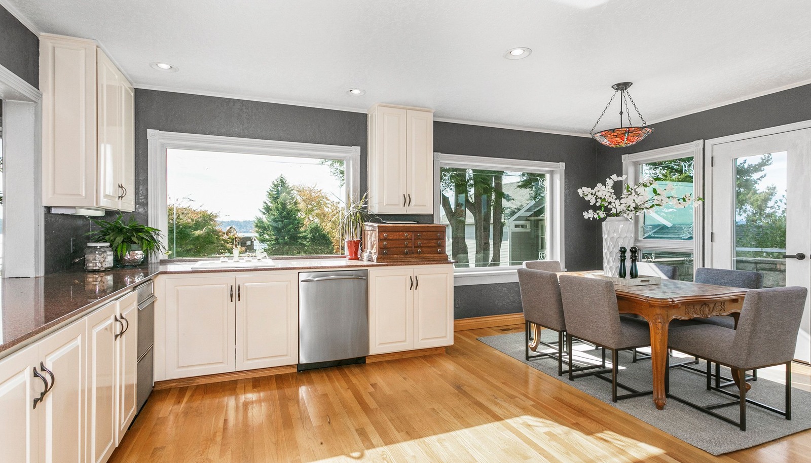 Huge windows to take in the view while you cook, eat or entertain. A second sink, acres of counter space and second dishwasher make prep and cleanup a breeze.