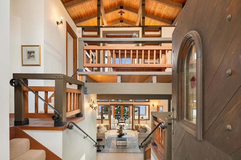 Beautiful custom mill / woodwork, attention to detail and top quality construction attract your immediate attention upon entering this home, until you find yourself totally captivated by the coveted, 180 degree unobstructed westerly Lake, city, mountain and sunset views from every main living space in this treasured home.